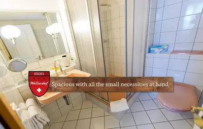 Ein Badezimmer in der Unterkunft Hotel Walliserhof - The Dom Collection