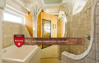 Ein Badezimmer in der Unterkunft Hotel Walliserhof - The Dom Collection