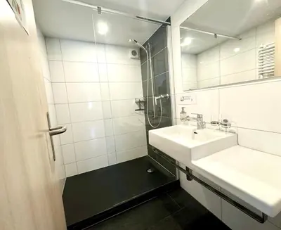 Ein Badezimmer in der Unterkunft Haus Chalet Arnika