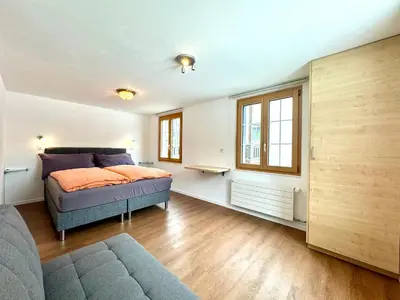 Ein Bett oder Betten in einem Zimmer der Unterkunft Haus Chalet Arnika