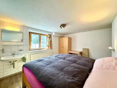 Ein Bett oder Betten in einem Zimmer der Unterkunft Haus Chalet Arnika