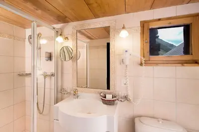 Ein Badezimmer in der Unterkunft Hotel Romantica