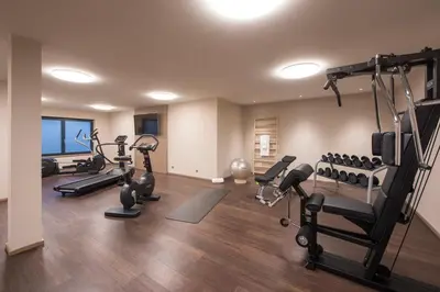 Das Fitnesscenter und/oder die Fitnesseinrichtungen in der Unterkunft Christiania Residence