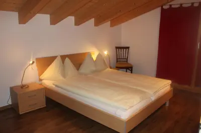 Ein Bett oder Betten in einem Zimmer der Unterkunft Wakatipu-Lodge