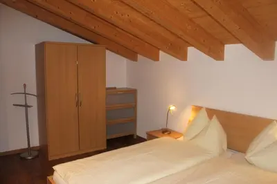 Ein Bett oder Betten in einem Zimmer der Unterkunft Wakatipu-Lodge