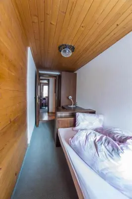 Ein Bett oder Betten in einem Zimmer der Unterkunft Apartment Maria by Interhome