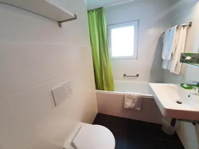 Ein Badezimmer in der Unterkunft Ferienwohnungen Wallis - Randa bei Zermatt