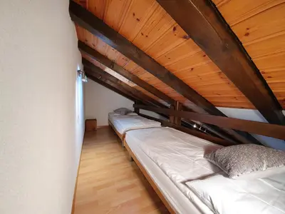 Ein Bett oder Betten in einem Zimmer der Unterkunft Ferienwohnungen Wallis - Randa bei Zermatt