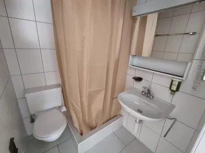 Ein Badezimmer in der Unterkunft Hotel Restaurant Jungfrau