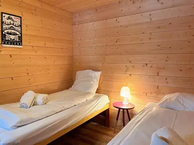 Ein Bett oder Betten in einem Zimmer der Unterkunft Chalet Marolly - Evolène