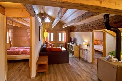 Ein Bett oder Betten in einem Zimmer der Unterkunft Appartement sous les combles - Chalet La Biolle - Vercorin