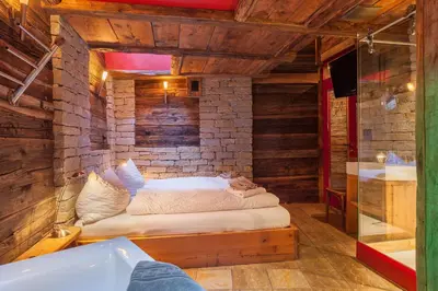 Ein Bett oder Betten in einem Zimmer der Unterkunft Chalet Schwalbennest