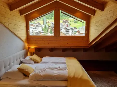 Ein Bett oder Betten in einem Zimmer der Unterkunft Penthouse Apartment Perla