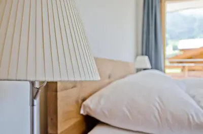 Ein Bett oder Betten in einem Zimmer der Unterkunft Chalet Rothenegg - GRIWA RENT AG
