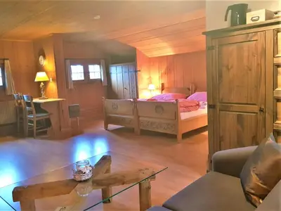 Ein Bett oder Betten in einem Zimmer der Unterkunft B & B Brienz