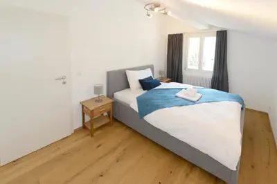 Ein Bett oder Betten in einem Zimmer der Unterkunft Zer Treichi