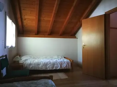 Ein Bett oder Betten in einem Zimmer der Unterkunft Rustico Al Noce