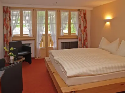 Ein Bett oder Betten in einem Zimmer der Unterkunft Hotel Steinbock