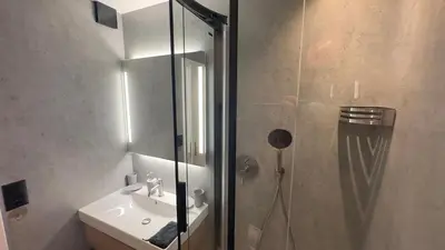 Ein Badezimmer in der Unterkunft Chalet Acheregg