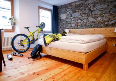 Ein Bett oder Betten in einem Zimmer der Unterkunft Bed&Bike Tremola San Gottardo