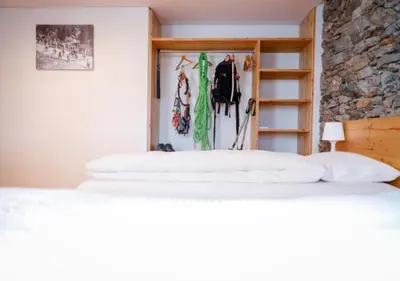 Ein Bett oder Betten in einem Zimmer der Unterkunft Bed&Bike Tremola San Gottardo
