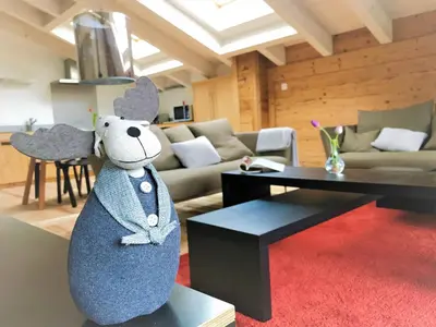 Ein Sitzbereich in der Unterkunft Chalet ELK Lenk