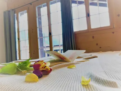 Ein Bett oder Betten in einem Zimmer der Unterkunft Chalet ELK Lenk