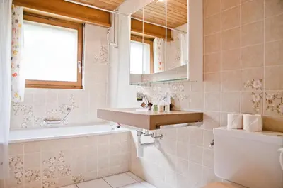 Ein Badezimmer in der Unterkunft Apartment Aare 3.5 by GriwaRent AG