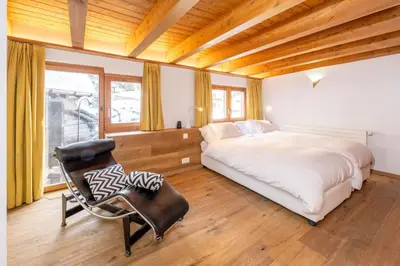Ein Bett oder Betten in einem Zimmer der Unterkunft Haus Genepy