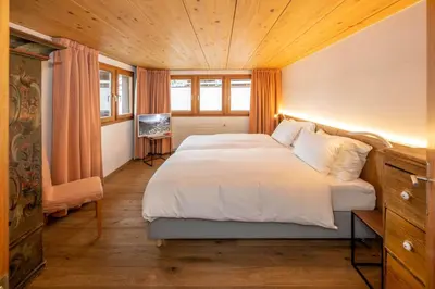 Ein Bett oder Betten in einem Zimmer der Unterkunft Haus Genepy
