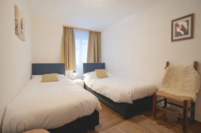 Ein Bett oder Betten in einem Zimmer der Unterkunft Chalet Talisman