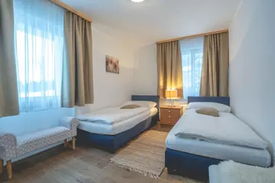 Ein Bett oder Betten in einem Zimmer der Unterkunft Chalet Talisman