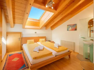 Ein Bett oder Betten in einem Zimmer der Unterkunft Apartments Aura