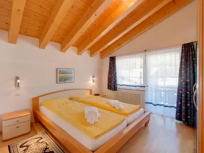 Ein Bett oder Betten in einem Zimmer der Unterkunft Apartments Aura
