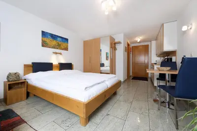 Ein Bett oder Betten in einem Zimmer der Unterkunft Apartments Aura