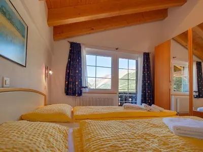 Ein Bett oder Betten in einem Zimmer der Unterkunft Apartments Aura