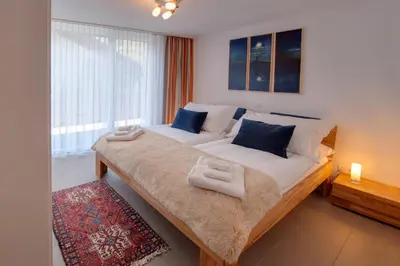 Ein Bett oder Betten in einem Zimmer der Unterkunft Haus Powder Snow