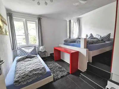 Ein Bett oder Betten in einem Zimmer der Unterkunft Apartments Steinbock