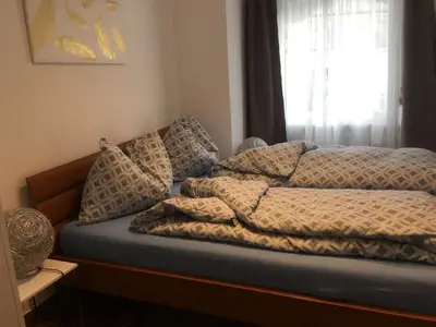 Ein Bett oder Betten in einem Zimmer der Unterkunft Apartments Steinbock
