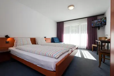 Ein Bett oder Betten in einem Zimmer der Unterkunft Hotel-Restaurant Ackersand