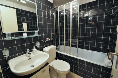 Ein Badezimmer in der Unterkunft Haus Armina - Apartment Edward