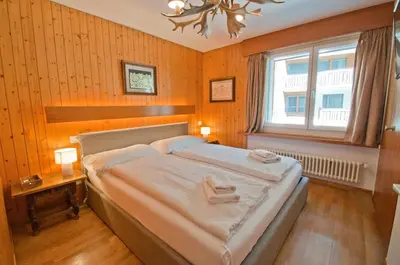 Ein Bett oder Betten in einem Zimmer der Unterkunft La Villa Emeline - Apartment Emilie
