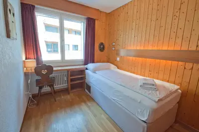 Ein Bett oder Betten in einem Zimmer der Unterkunft La Villa Emeline - Apartment Emilie