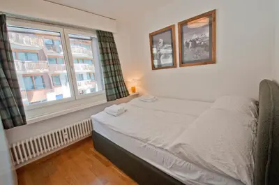 Ein Bett oder Betten in einem Zimmer der Unterkunft La Villa Emeline - Apartment Emilie