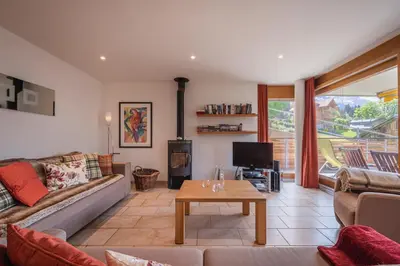 Ein Sitzbereich in der Unterkunft Chalet Am Acher 3