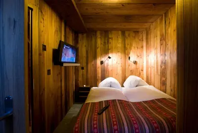 Ein Bett oder Betten in einem Zimmer der Unterkunft Chalet Z'Gogwärgji
