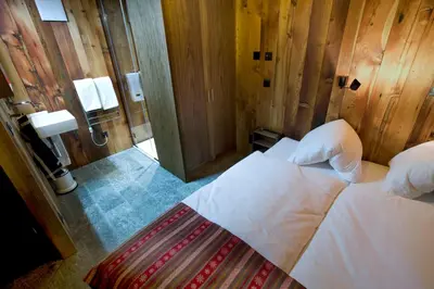Ein Bett oder Betten in einem Zimmer der Unterkunft Chalet Z'Gogwärgji