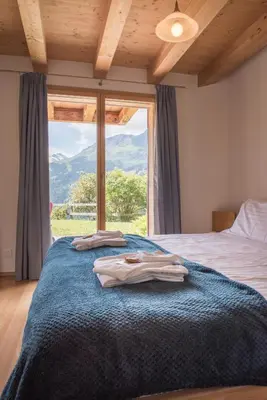 Ein Bett oder Betten in einem Zimmer der Unterkunft Chalet Wyssbirg