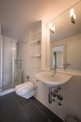 Ein Badezimmer in der Unterkunft Chalet Wyssbirg