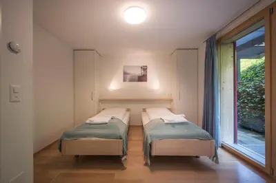 Ein Bett oder Betten in einem Zimmer der Unterkunft Chalet Wyssbirg